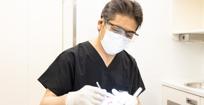 体に負担の少ない治療法・材料を選択